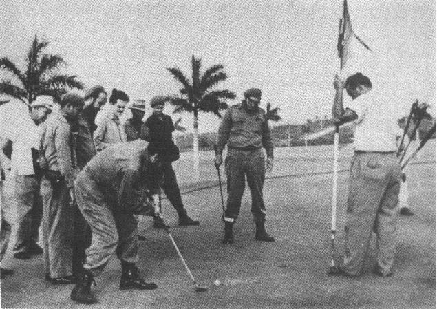 Che playing golf with Fidel Castro.